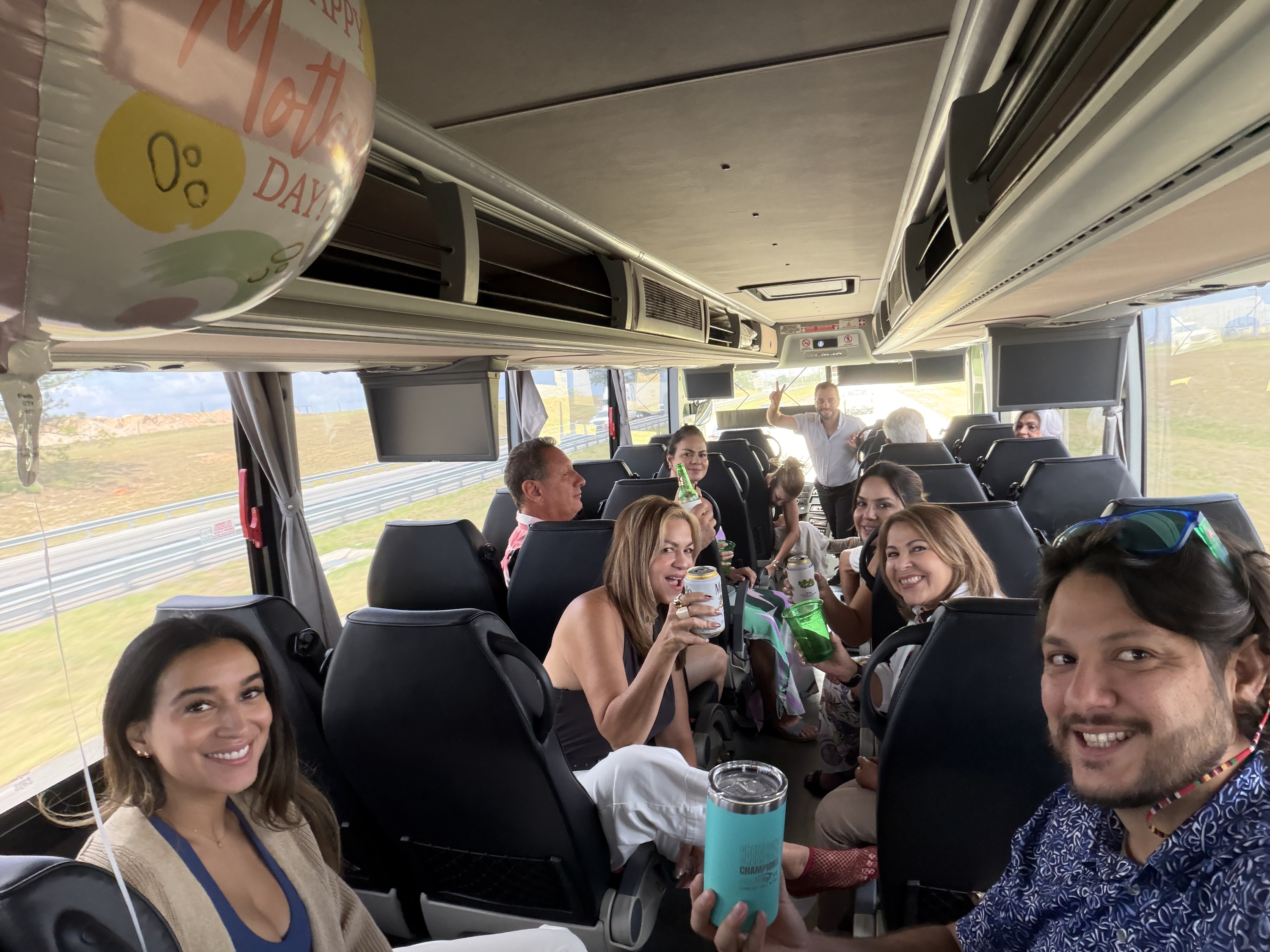 A family group celebrating Mother's Day aboard an EZ Bus coach